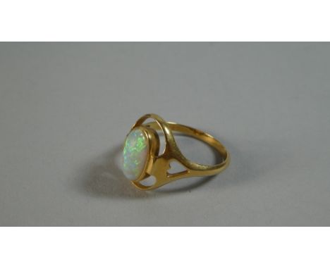 An 18ct Gold and Opal Dress Ring, 3.8gms