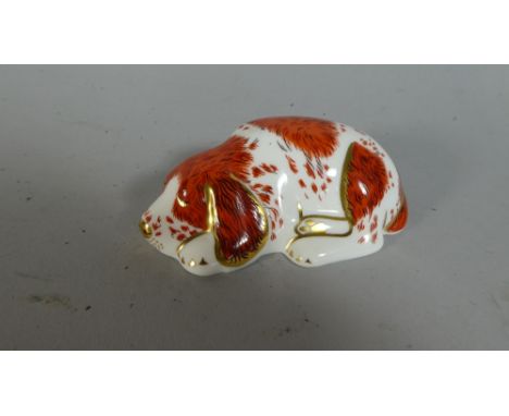 A Royal Crown Puppy Paperweight, Gold Button