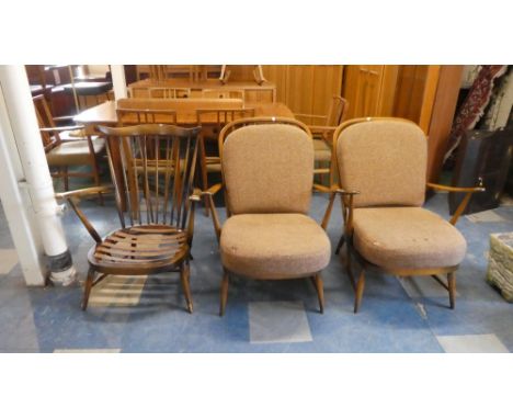 A Pair of Ercol Armchairs and One Other by Ercol