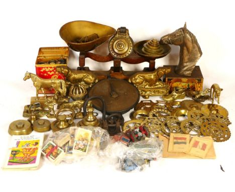 A collection of brass and silver plated wares, to include horse brasses, scales &amp; weights, tankards, loose cutlery, figur