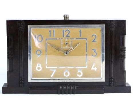 A 1950s Art Deco style bakelite mantel clock by Smiths, having a 30 hour movement, 17cm tall, together with a 1920s French ex