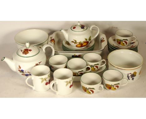 A collection of Royal Worcester dinner &amp; tea ware 'Evesham' to include dinner plates, fruit bowls, cups &amp; saucers, mu
