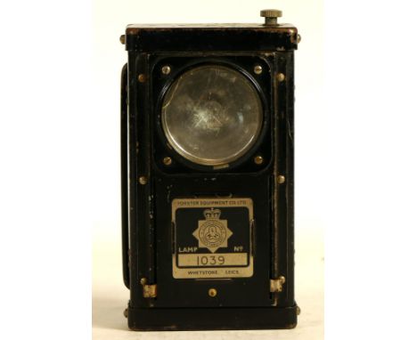 An early 20th century policeman's torch, the plaque stamped Forster Equipment Co Ltd. Lincolnshire Constabulary. Lamp No 1039