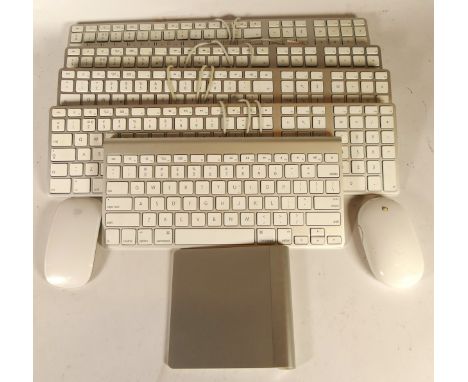 Four wired full sized Apple keyboards, a wireless apple keyboard, track pad, a Magic mouse and a mighty mouse 