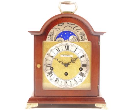 A modern Franz Hermie mahogany bracket clock, having chased brass dial, silvered chapter ring, moonphase with jewelled 8 day 