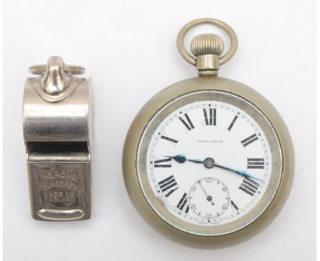 An L.N.E.R railway issue pocket watch, the nickel plated case stamped, together with a B.R railway issue whistle, together wi