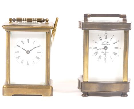 A French brass carriage clock, having enamelled dial with Roman numerals and jewelled 8 day movement, 12cm tall, together wit