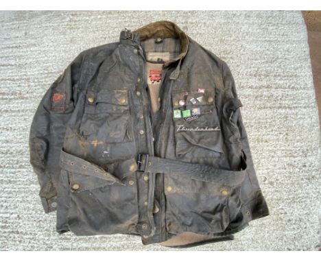 A Belstaff Trialmaster wax jacket and liner, with some enamel badges attached including Woburn Abbey, 1970s, 1967 TT etc.