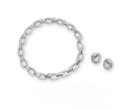 BOUCHERON: 'SERPENT BOHÈME' BRACELET/NECKLACE COMBINATION AND EARCLIP SUITEThe necklace composed of textured oval links alter
