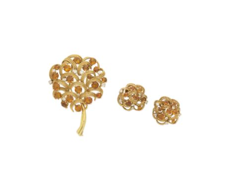BOUCHERON: CITRINE AND DIAMOND-SET BROOCH AND EARCLIP SUITE, CIRCA 1954Of openwork foliate design, each stylised flower set w