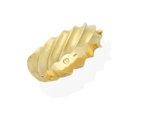 GRIMA: BANGLE, CIRCA 1995Of fluted form and hammered finish, signed Grima, inner circumference 17.0cm, maker's pouchFootnotes