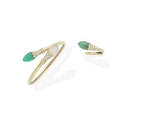 GAY FRÈRES: GEM-SET BANGLE AND RING SUITEOf sprung reeded form, issuing fluted chrysoprase and rock crystal terminals, via pa