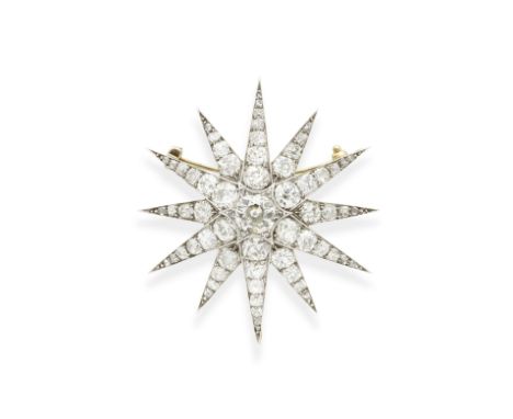 DIAMOND STAR BROOCH/PENDANT, CIRCA 1890The twelve-pointed star, set throughout with graduating old cushion-shaped diamonds, m