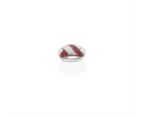 RUBY AND DIAMOND RING, FRENCH, MID 20TH CENTURYOf bombé form, composed of interlocking panels, pavé-set with brilliant-cut di