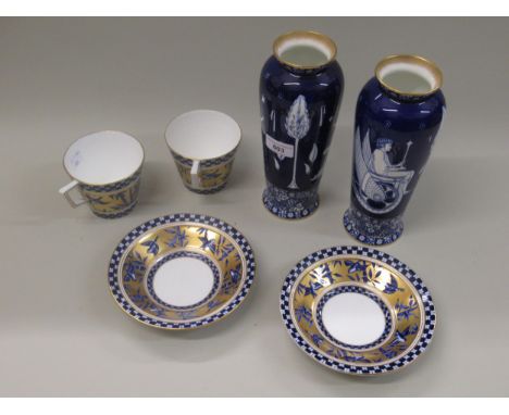 Pair of Royal Doulton blue and white vases of tapering form decorated with classical figures, 23cm high together with a pair 