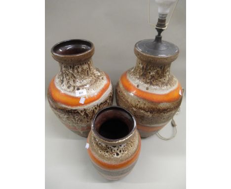 West Germany pottery baluster form lamp base, together with a similar vase and another smallerSmall loss to glaze on little v
