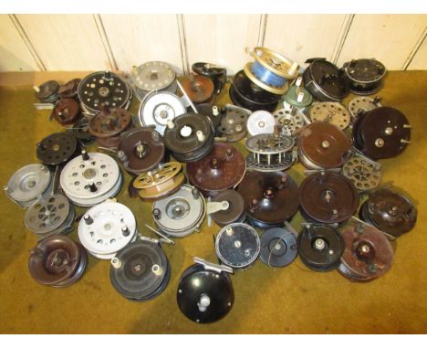 Collection of vintage centre pin fishing reels and spools, various makers 
