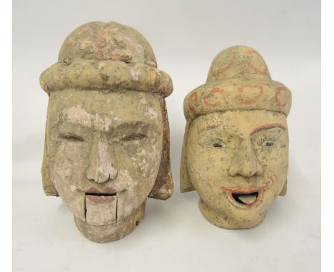 Two Burmese carved and painted puppet heads, the tallest 21cm 