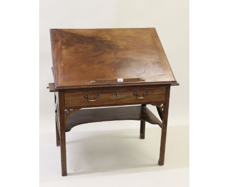 George III mahogany Chippendale style architects table, with hinged top supported on ratcheted brackets, with a fixed ledge a