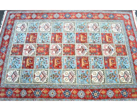 Tabriz all-over tile pattern rug in shades of brick red, pale blue and cream, 205 x 135cm approximately 