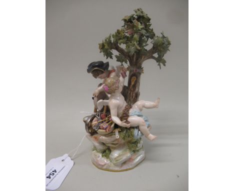 Meissen figural group with Cupid sharpening an arrow seated beneath a tree with another Cupid, 20.5cm high (some restoration)