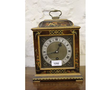 Small early to mid 20th Century black chinoiserie lacquer mantel clock with a single train movement, the pagoda case with loo