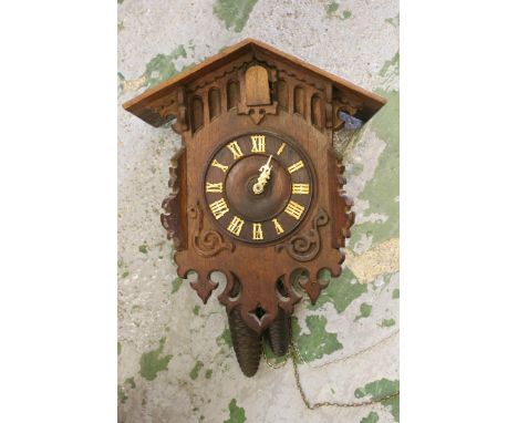 Early 20th Century oak cuckoo clock with two train weight driven movement 