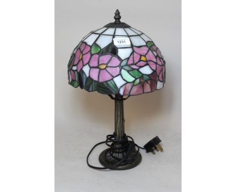 Reproduction bronzed composition table lamp with a leaded glass shade, 41cm high 