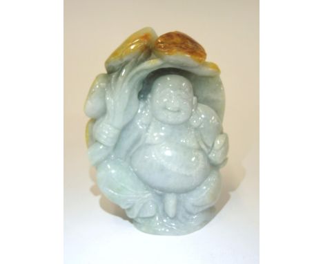 20th Century two colour celadon jade figure of a standing Buddha, 11cm high approximately 