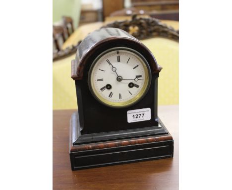 19th Century black slate and rouge marble two train mantel clock, together with an Edwardian brass anniversary clock under a 