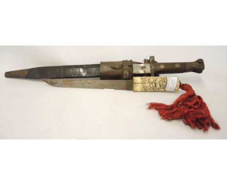 Early to mid 20th Century bayonet in a leather scabbard with leather belt attachment, together with a Japanese carved bone ha