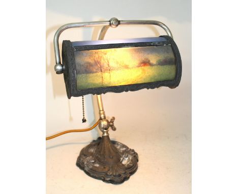 20th Century silvered adjustable desk lamp with shade, having handpainted landscape panel, signed Miller to the base34cm tall