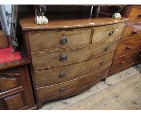 Large 19th Century mahogany and line inlaid bow front chest of two short and three long drawers with circular brass ring hand