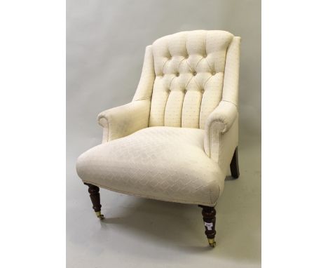 Pair of modern button upholstered square tub shaped armchairs, on turned tapering supports with casters 