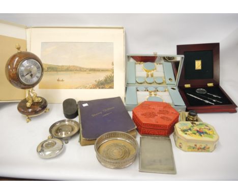 Album containing a small quantity of World stamps, an album containing a collection of prints of the Danube and Vienna, vanit