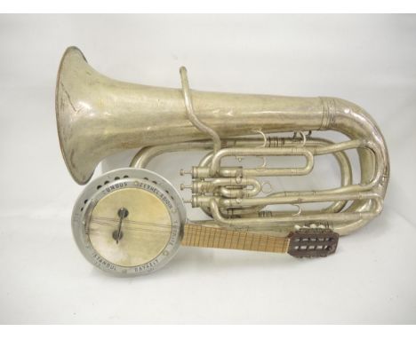 Boosey & Co. silver plated tuba and a Turkish banjo eukelele 