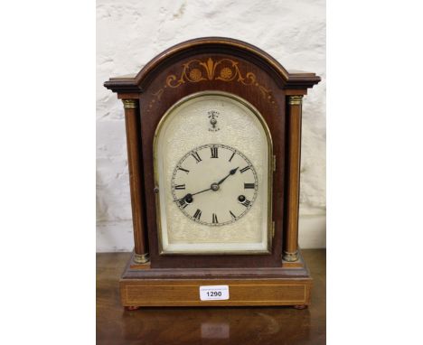 Edwardian mahogany and marquetry inlaid mantel clock with an engraved silvered dial, circular chapter ring and Roman numerals
