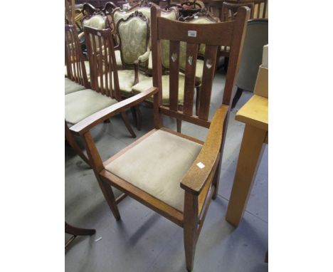 Arts and Crafts oak elbow chair with drop-in seat, modern rattan and iron garden chair and a camel stool with loose Kelim cus
