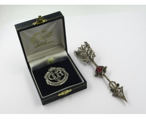 King George VI marcasite coronation brooch, together with a paste set arrow brooch 