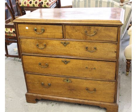 18th Century oak chest of two short over three long drawers with replacement brass handles, raised on bracket feet , 19cm hig