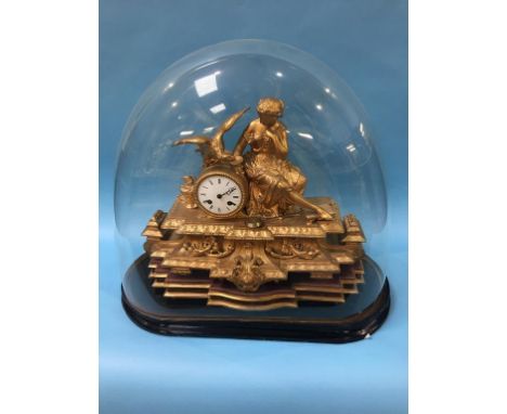 Continental gilt mantle clock and glass dome