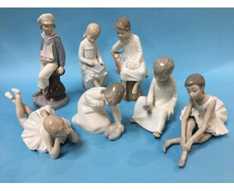 Seven various figures, Lladro etc.