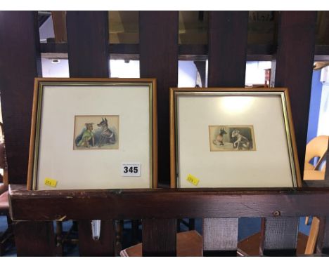 A small pair of Louis Wain prints of dogs, 6 x 7 cm