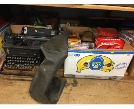 Shelf of assorted including a typewriter