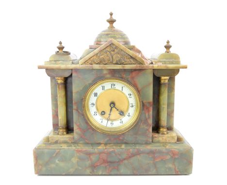 Victorian onyx mantel clock, of architectural form, the twin train movement striking on a gong, 35 cm high, 34 cm wide