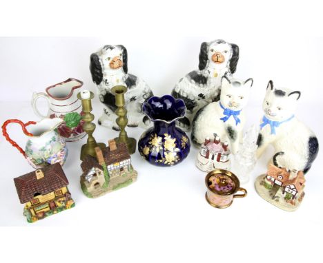 Collection of Staffordshire pottery cottages, two spill vases, pair of Spaniels, pair of cats, jugs, blue and white china, br