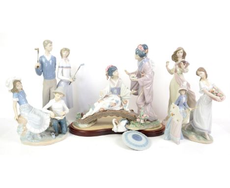 Six Lladro and NAO figures and figural groups to include two geisha on a bridge, H 33cm, among others, along with Royal Worce