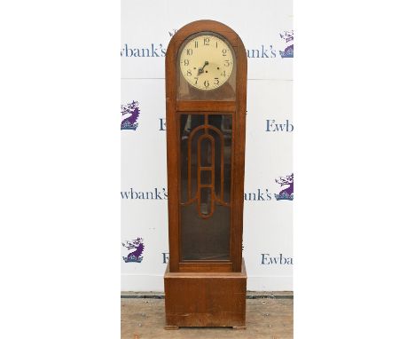 † 1920s oak short longcase clock, with silvered dial arched case and glazed trunk door, the three train spring movement strik