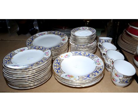 Royal Crown Derby tea dinner service decorated with blue scrolls and flowers, 53 pieces,