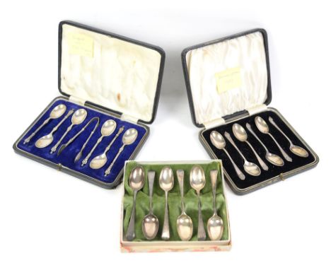 Set of six Apostle tea spoons and sugar tongs, cased, Sheffield 1930-1932, set of tea spoons, cased, Birmingham 1933, and a s